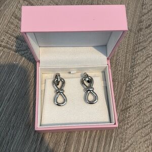 Mach and Mach silver bow earrings